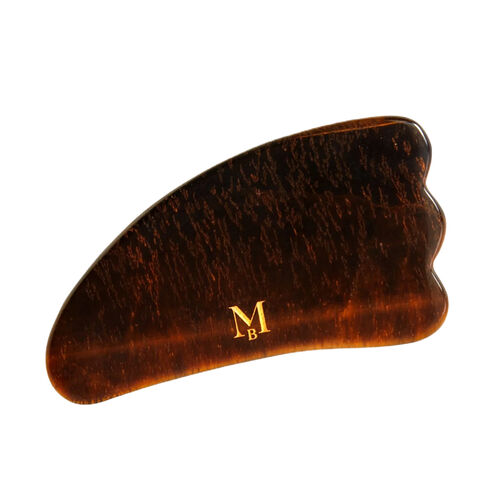 gua sha taşı yüz masajı