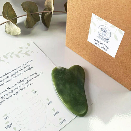 yüz gua sha taşı